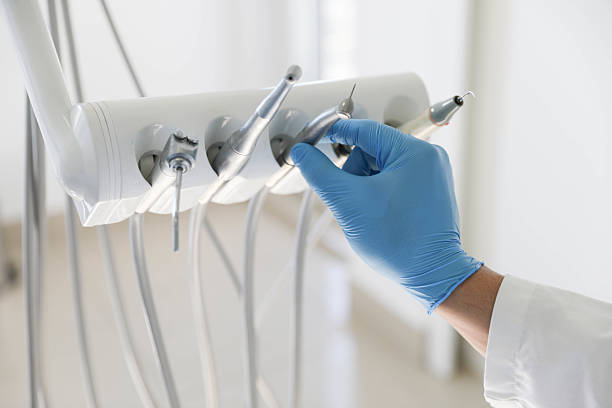 Professional Tooth Extraction technician working in Cutchogue, NY